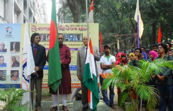 Assistant High Commissioner of India, Rajshahi Sadar MP Fazle Hossain Badsha and Rajshahi University Vice Chancellor raising flags of India, Bangladesh and the university at the inauguration of the Film Festival of Two Bengals 